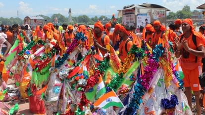 Kanwar Yatra 2024 Huge crowd in Haridwar 2.51 crore devotees take Gangajal so far in nine days Photos