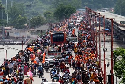 Kanwar Yatra 2024 Huge crowd in Haridwar 2.51 crore devotees take Gangajal so far in nine days Photos