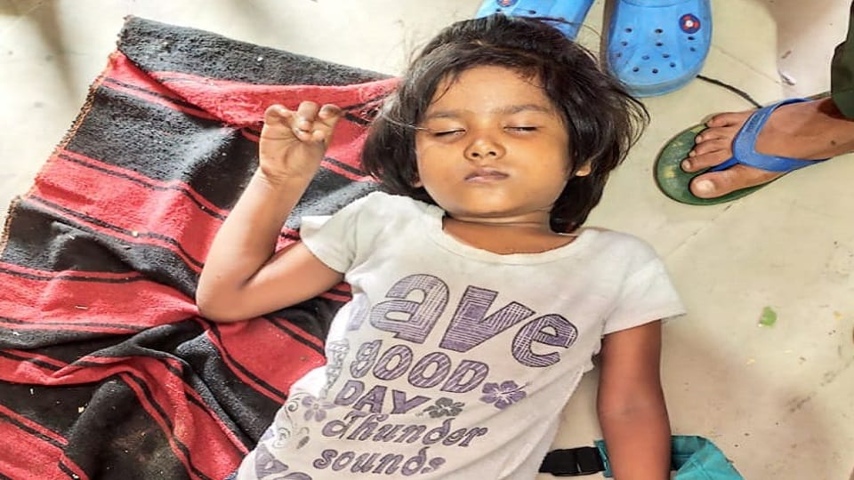 Girl student fainted in the heat