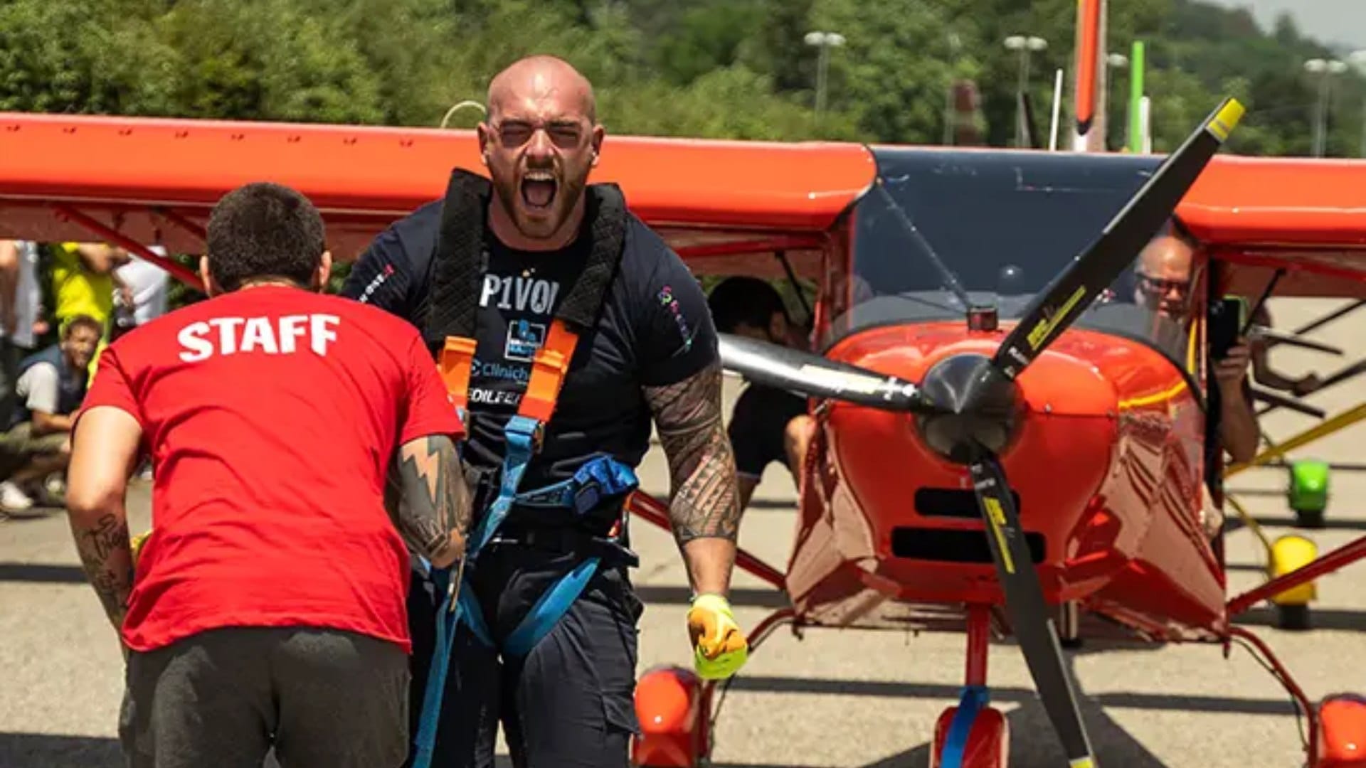 Italian man pulls three planes while walking on his hands in remarkable feat of strength