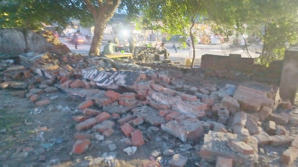 500 graves filled with rain water due to collapse of cemetery wall