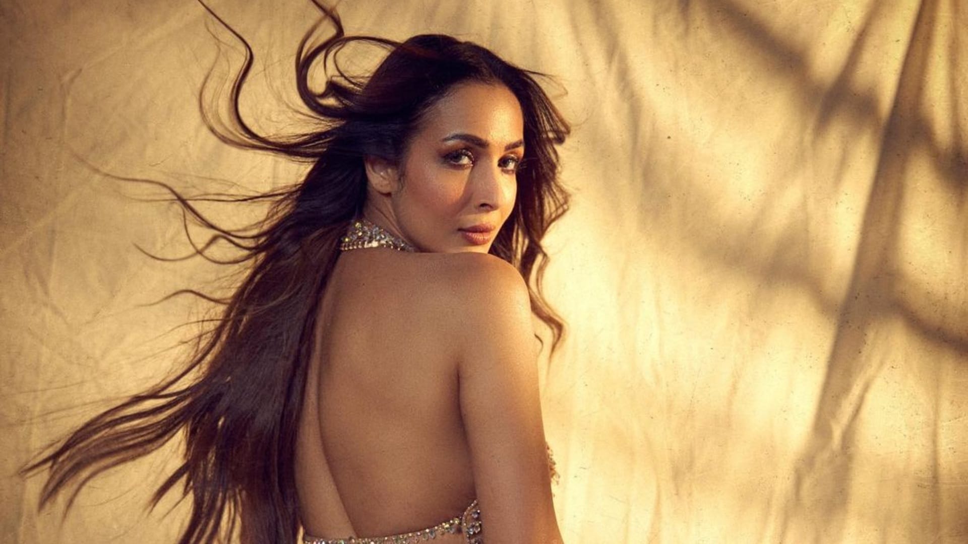 malaika arora compared with urfi javed wearing see through skirt and blazer