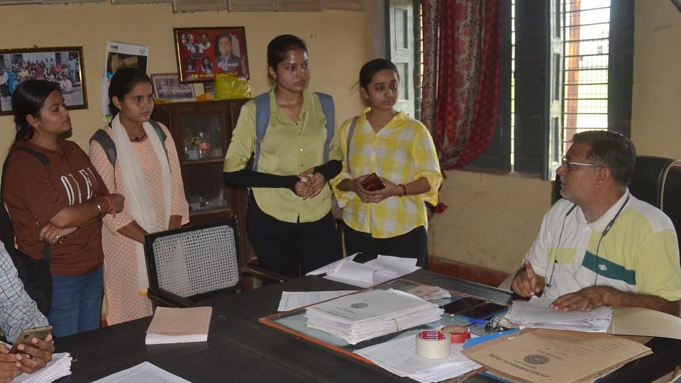 Students busy filling forms for special examination