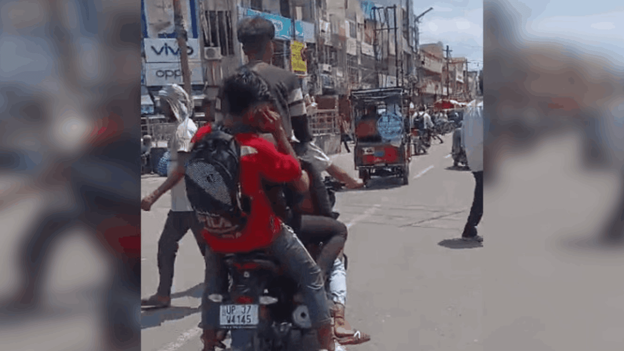 video of stunts performed by five youths riding a bike has surfaced in Hapur