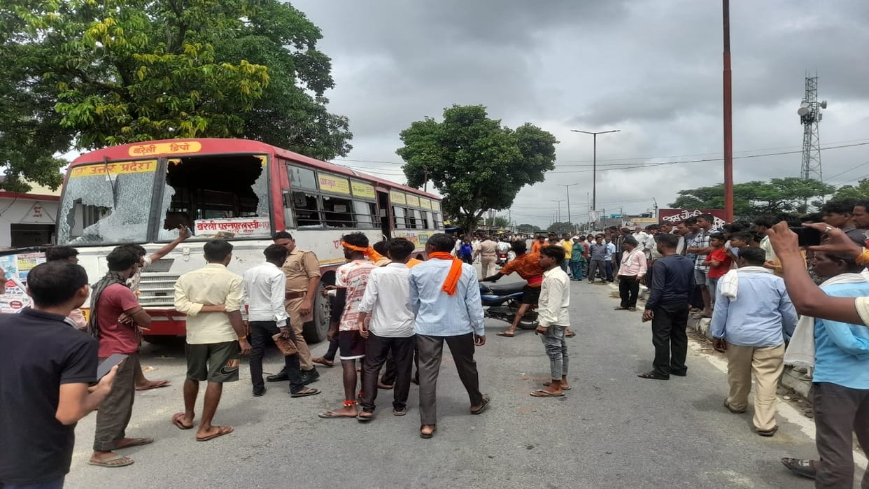 Two Kanwariyas injured hit by roadways bus angry people vandalism and highway blocked in lakhimpur kheri