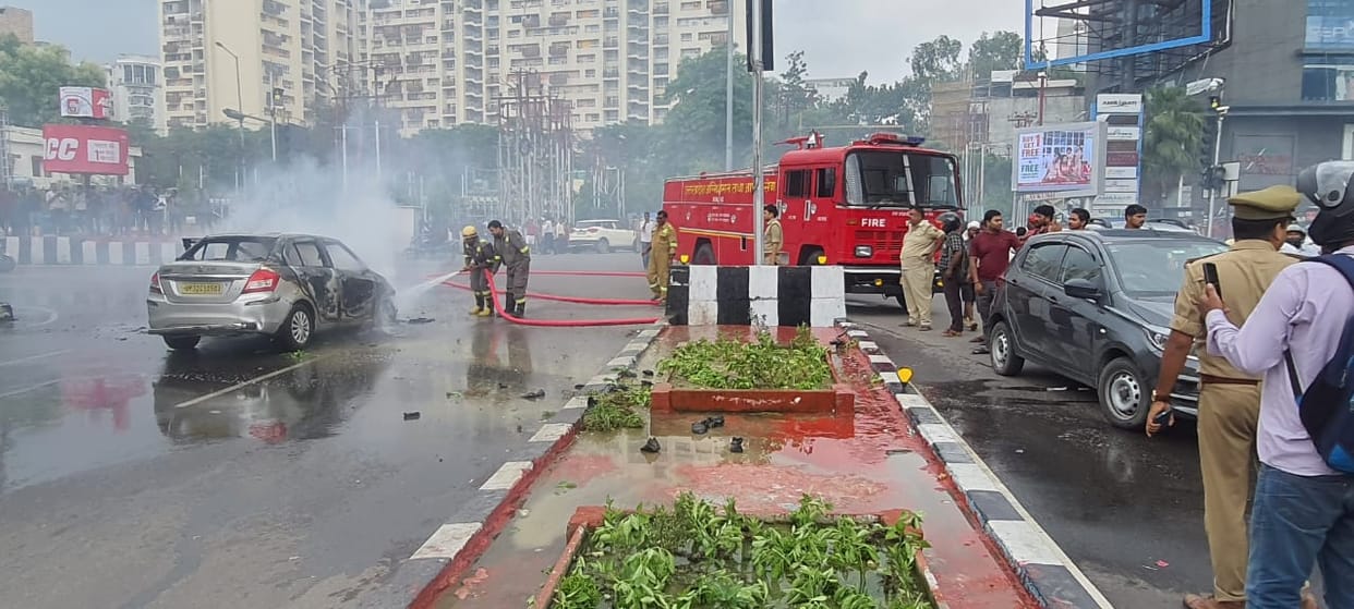 Fire broke out in a car near high court in Lucknow.