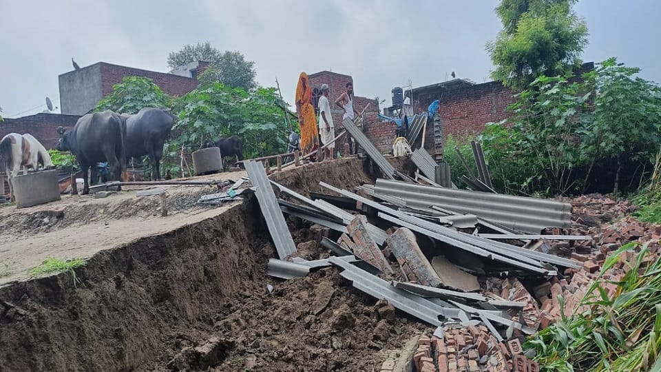 Tin shed wall collapsed in rain