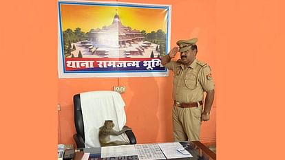 Ayodhya: A monkey sat on the chair of the police station in-charge, the policeman saluted him, this picture is in discussion A police man saluted a monkey in Ayodhya.
