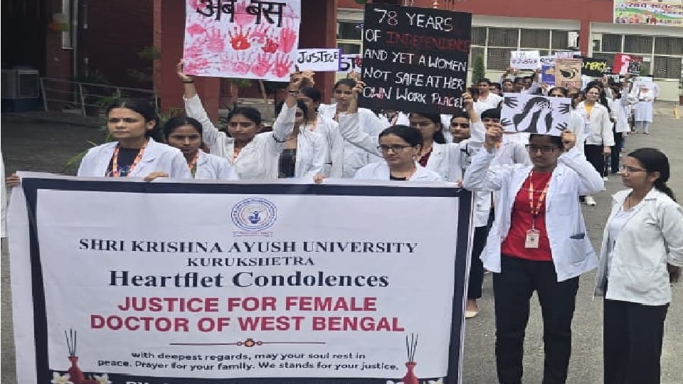Ayush University students took out a candle march to protest against brutality against a female doctor