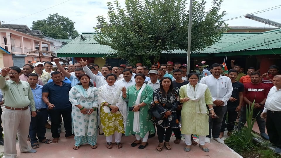 Demonstration demanding arrest of teacher and colleagues in pithoragarh