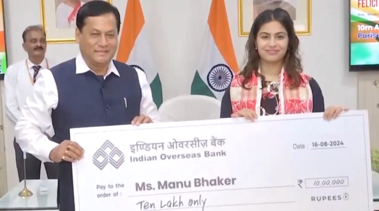 Union Minister Sarbananda Sonowal felicitates Manu Bhaker with a cheque of Rs 10 Lakhs  Paris Olympics 2024