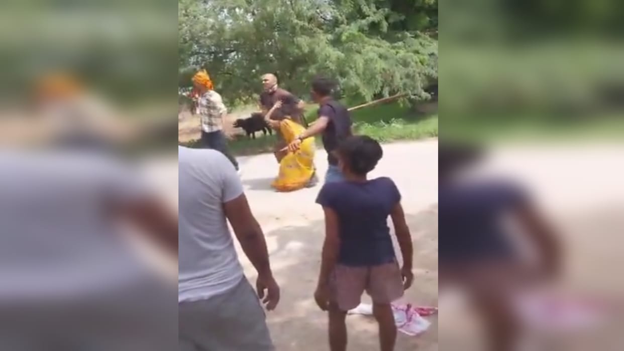 Woman forced to sit in car at gunpoint, six including husband named