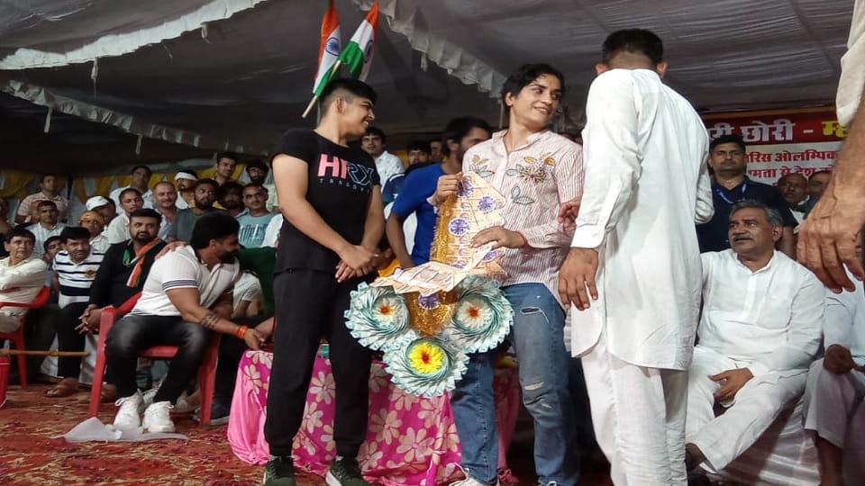 Vinesh Phogat's grand welcome in her ancestral village Balali in Charkhi Dadri