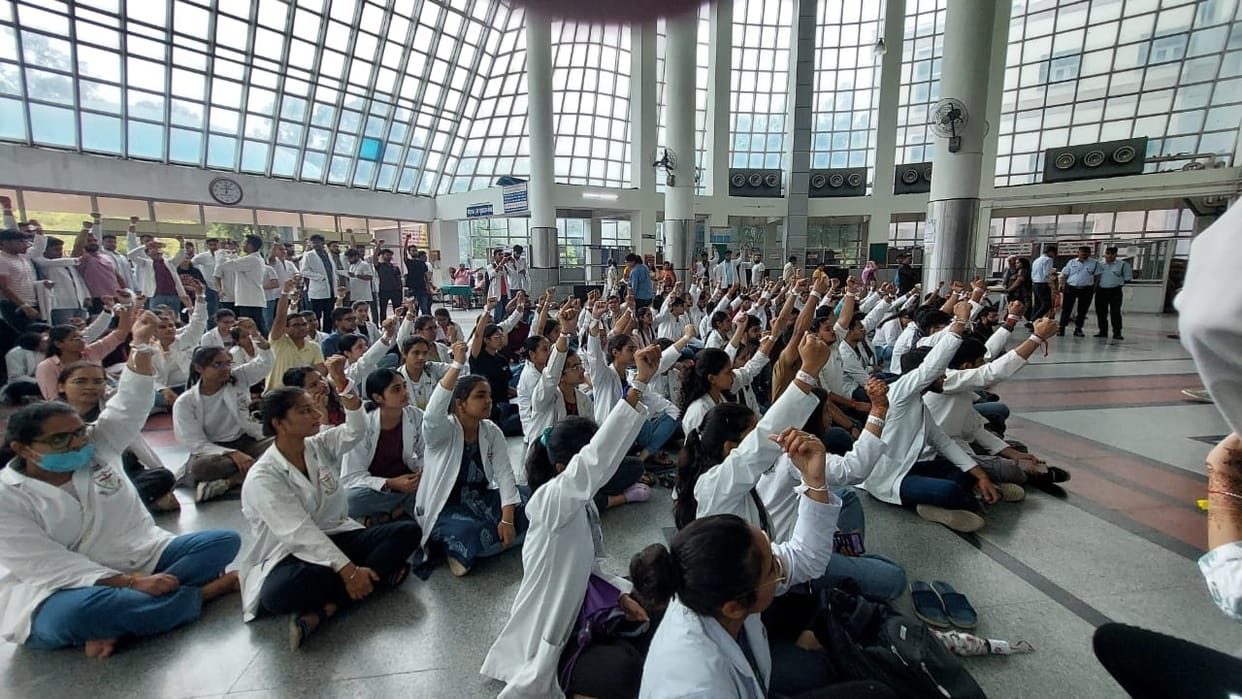 Symbolic protest demanding safety of healthcare workers at Rohtak PGI, white bands tied to each other
