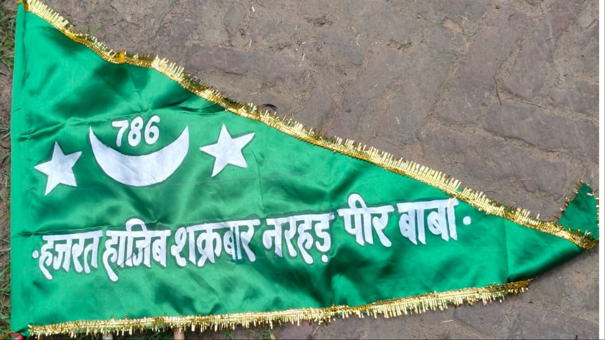 Charkhi Dadri: Village of Baghot stopped pedestrian carrying green flags printed with Chand-Sitara-786