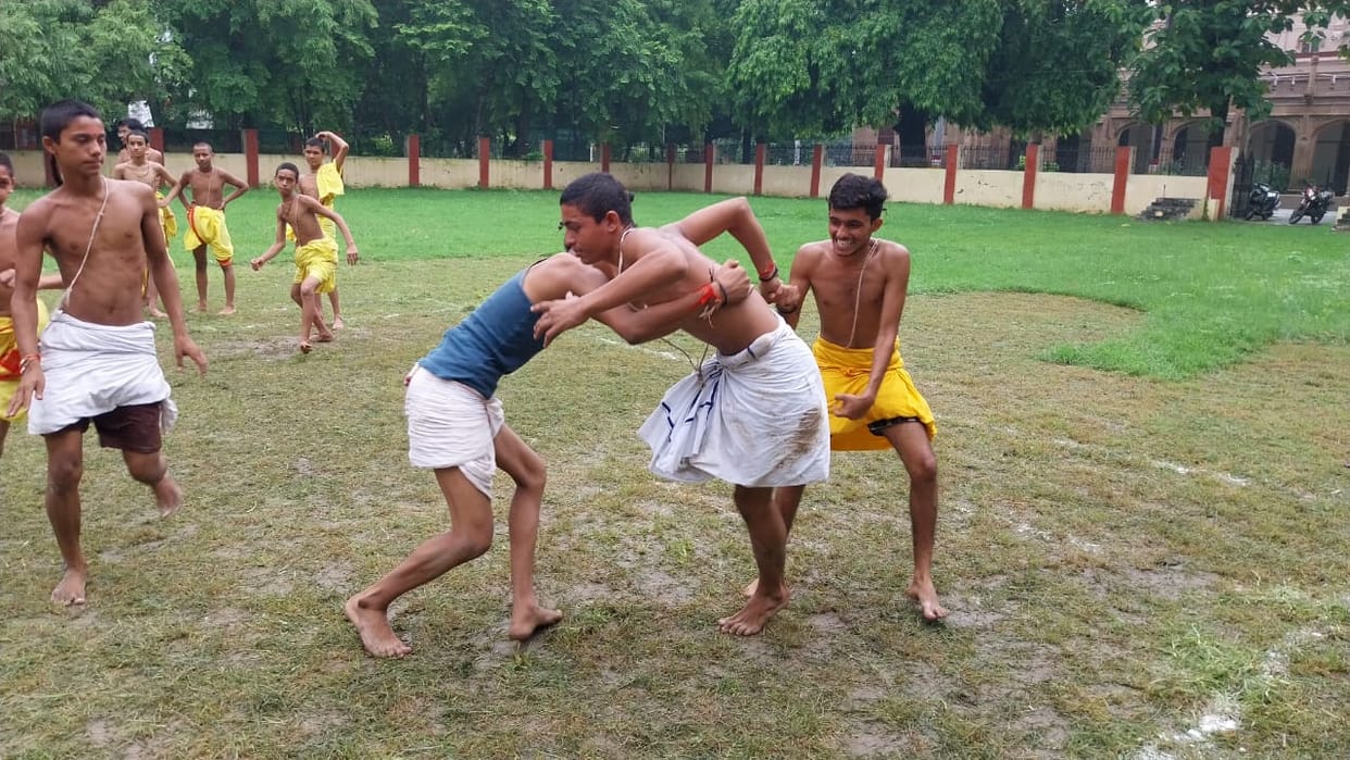 Kabaddi in traditional costumes with commentary in Sanskrit at Sampurnanand Sanskrit University