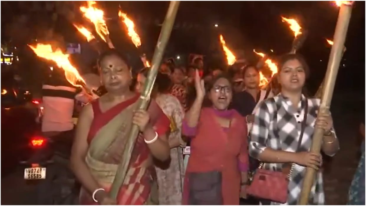 Women took to the streets to protest against the murder of a junior doctor took out a torch march