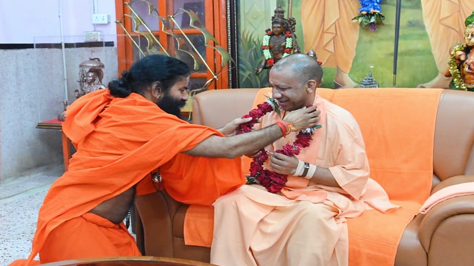 Yoga guru Swami Ramdev made a courtesy visit to CM Yogi offered prayers at Gorakhnath temple