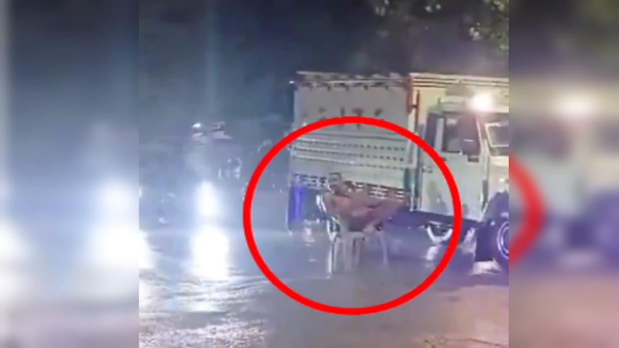 An intoxicated young man was sitting on a chair in the middle of the intersection, when the truck hit him he l