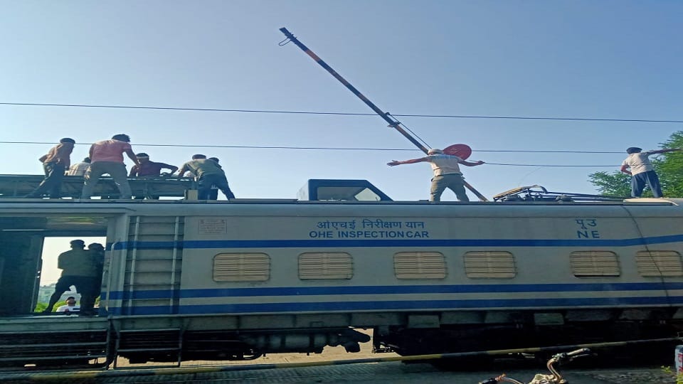 OHE damaged due to collision with canter at railway gate