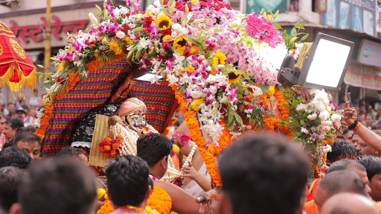 Ujjain Baba Mahakal Sawari came out riding on chariot showered flowers from helicopter see pictures