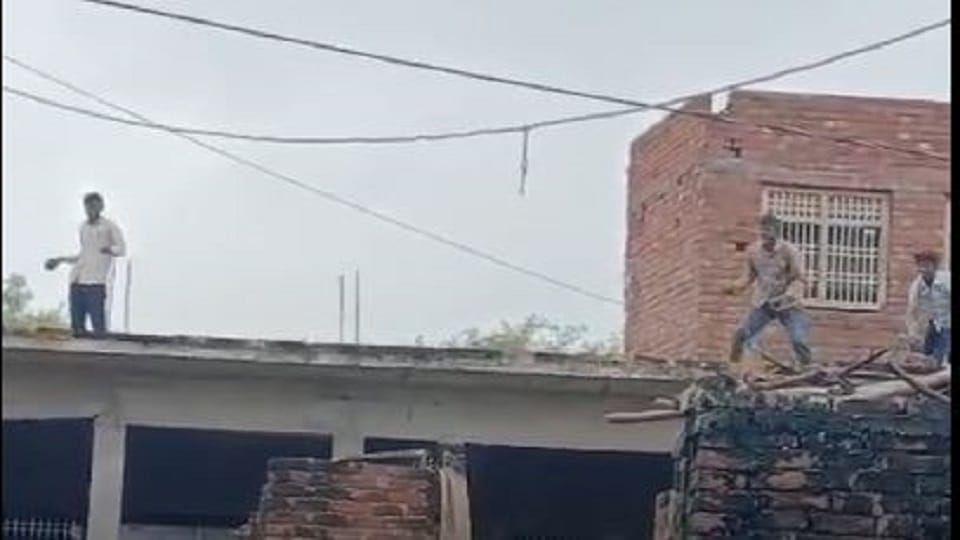 Two parties clashed in the dispute of building a temple, bricks and stones were thrown