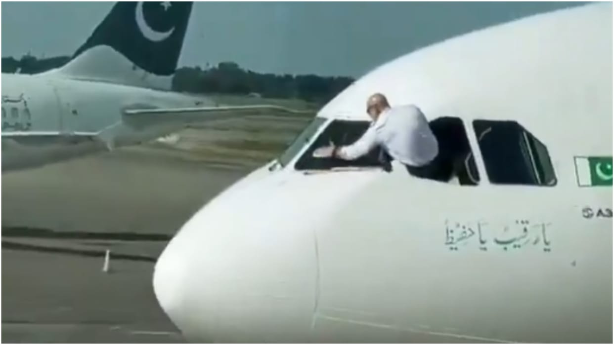 The disgrace of Pakistani airline PIA Pilot cleans planes wind screen like a car video goes viral