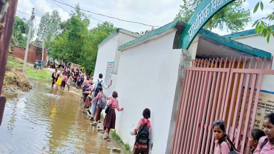 roads were flooded After the rain in Agra bikes were on roads and counters in shops were submerged