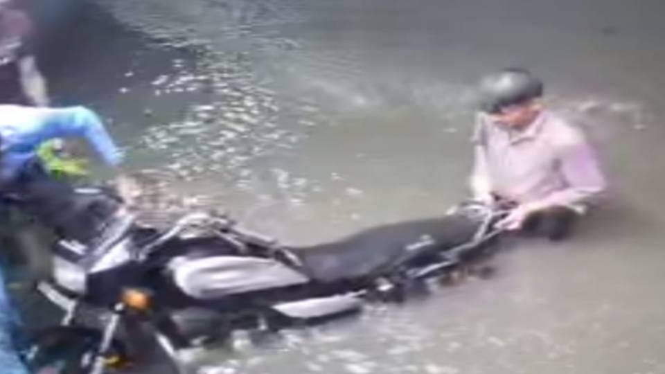 roads were flooded After the rain in Agra bikes were on roads and counters in shops were submerged