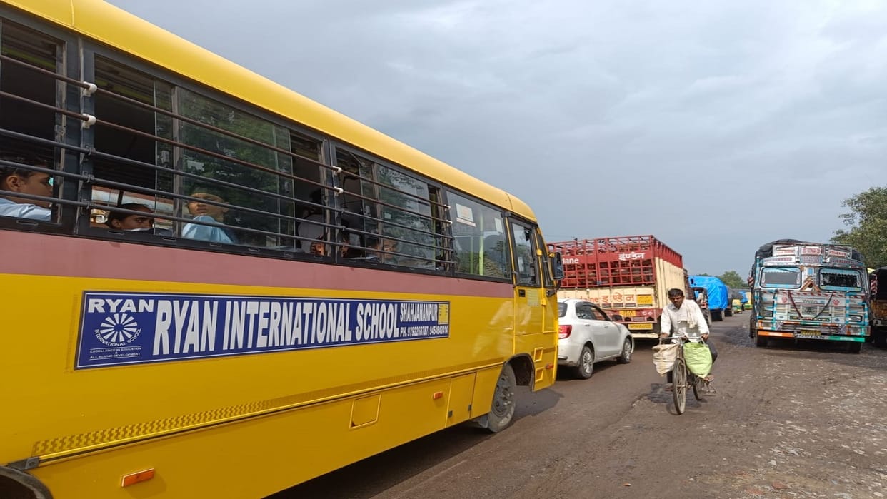 Trucks and tractor-trolleys blocked highway the railway rack point in Roza Shahjahanpur