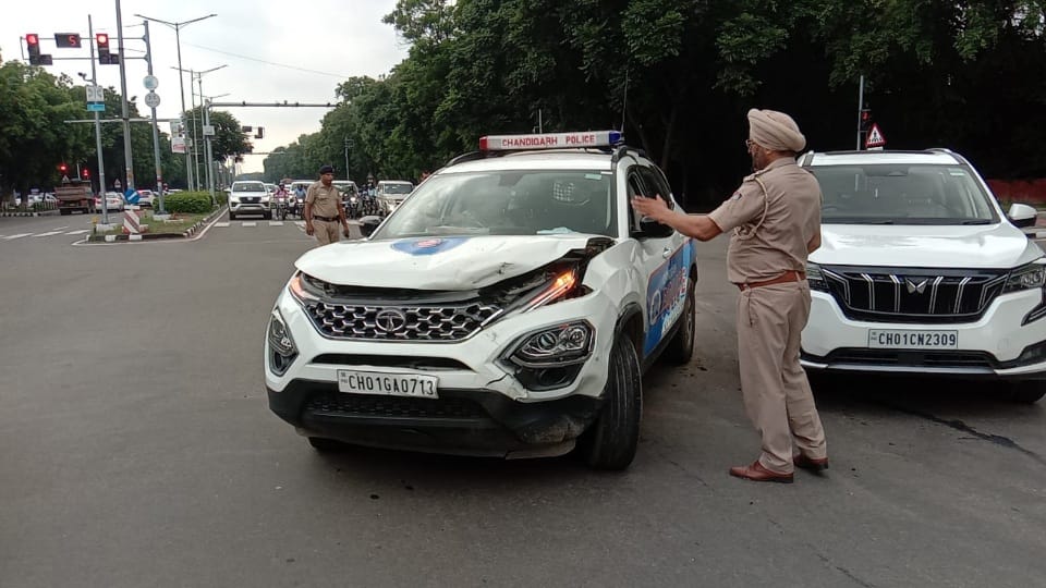 Chandigarh police break traffic rules police car red light jump and hit SUV