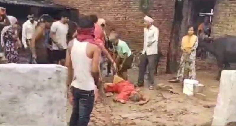 woman was beaten with sticks dragged by her legs video going viral In Mathura