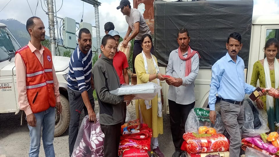 Food department distributed relief material to families in lohaghat