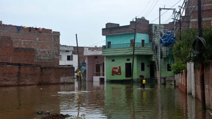 Flood In Varanasi Thousands of families affected by havoc of floods in swollen Ganga
