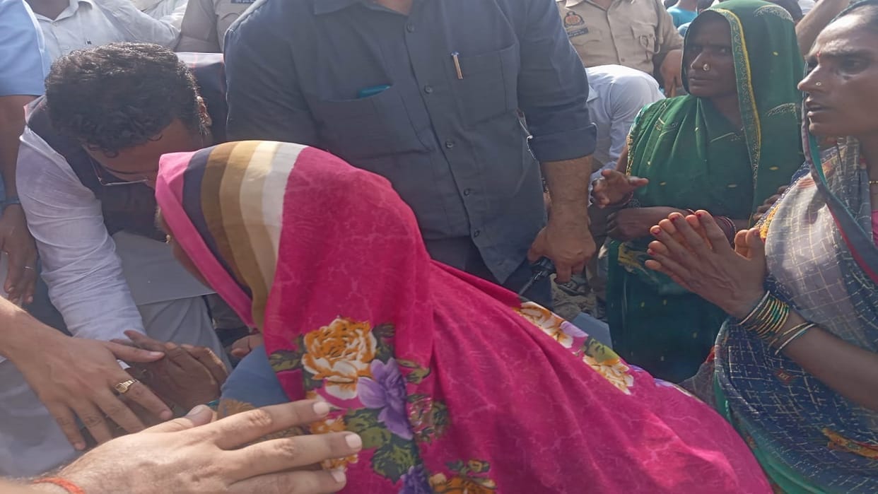 Women stood in front of the car of the minister and said please save our homes