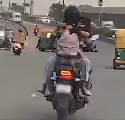 Traffic Police slaps Rs 11000 fine on motorcyclist after woman sitting on fuel tank hugging rider Viral Video