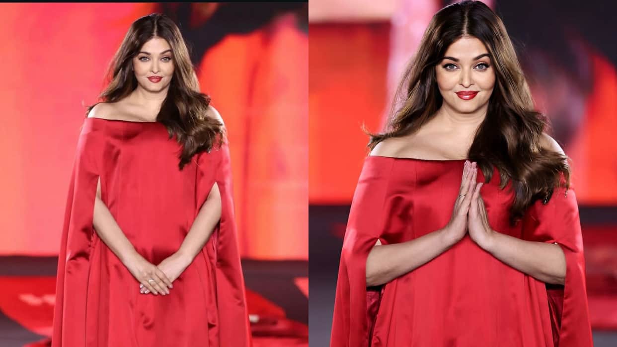 Aishwarya Rai Bachchan donned a red balloon hem dress with a dramatic train at Paris Fashion week