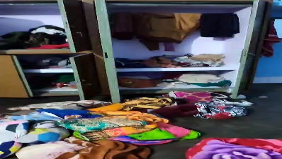 Theft by breaking the lock of Deputy Commissioner orderly house