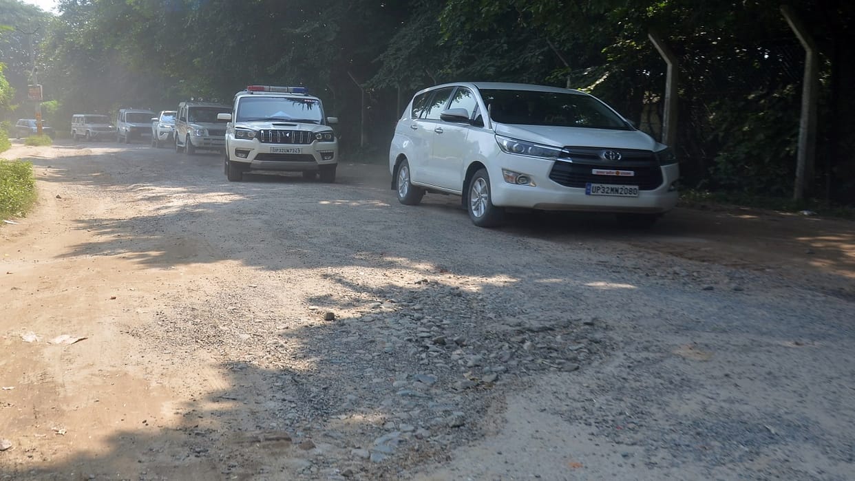 People are facing potholes on the road the minister in his luxury car did not realize it