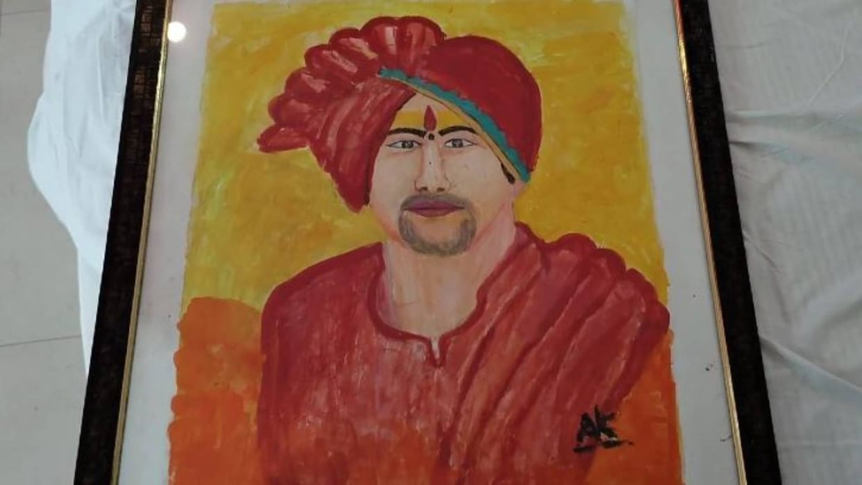 handicapped young man made picture of Dheerendra Shastri with his feet even Amitabh Bachchan follows artist
