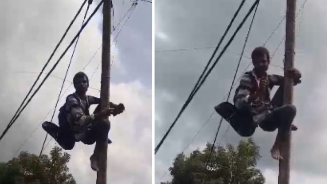 High voltage drama of young man by climbing an electric pole in mau