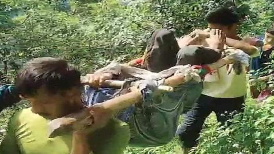 sick person was taken to the main road after walking 10 km from Uprakot village champawat
