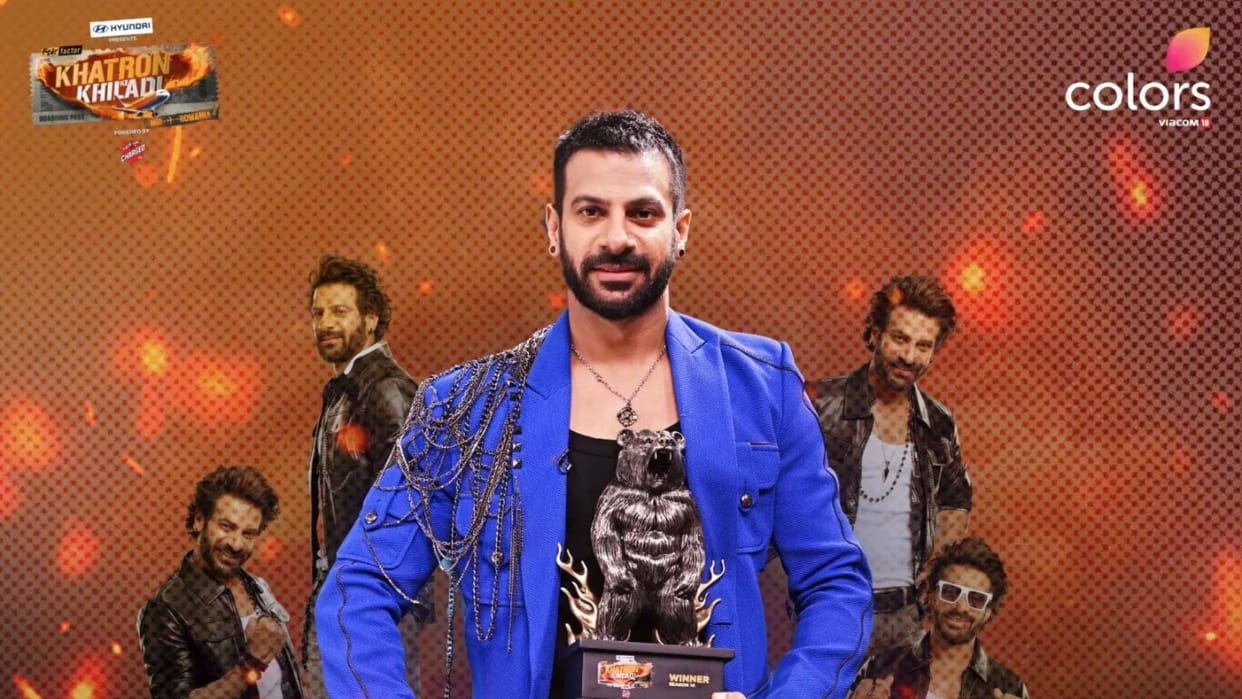 Khatron Ke Khiladi 14 Winner Karan Veer Mehra lift trophy of rohit shetty show took home a car and 20 lakh rs