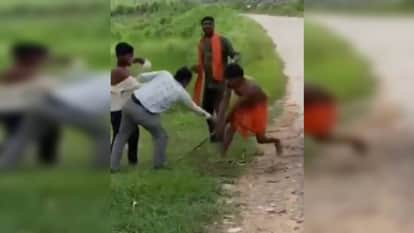 Singrauli Viral Video Dominance Sarpanch husband Young man beaten with sticks for complaining about corruption