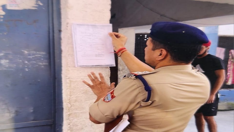 Attachment notice issued on the house of absconding Baba Anoop Singh in khatima