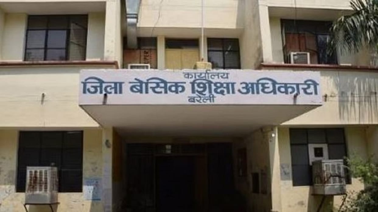 headmaster and teacher suspended for girls who made to clean toilets in school