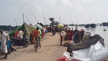Darbhanga Flood: बांध पर खुले आसमान में रहने को विवश बाढ़ पीड़ित, जानें प्रशासनिक दावों के बीच पीड़ितों की जुबानी Darbhanga Flood victims forced to live in open sky on dam know from victims amidst administrative claims