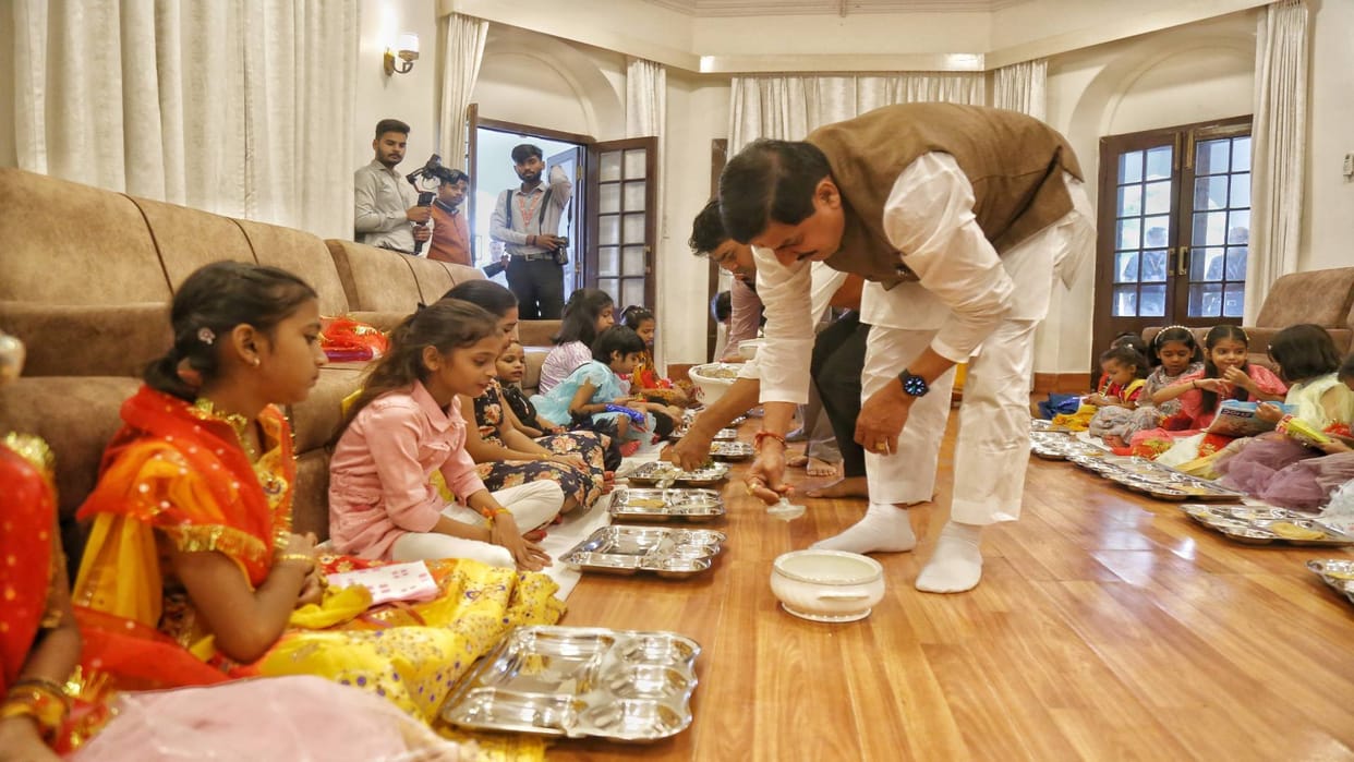 Kanya Poojan CM Mohan Yadav followed eternal tradition of Kanya Poojan and feast see photos