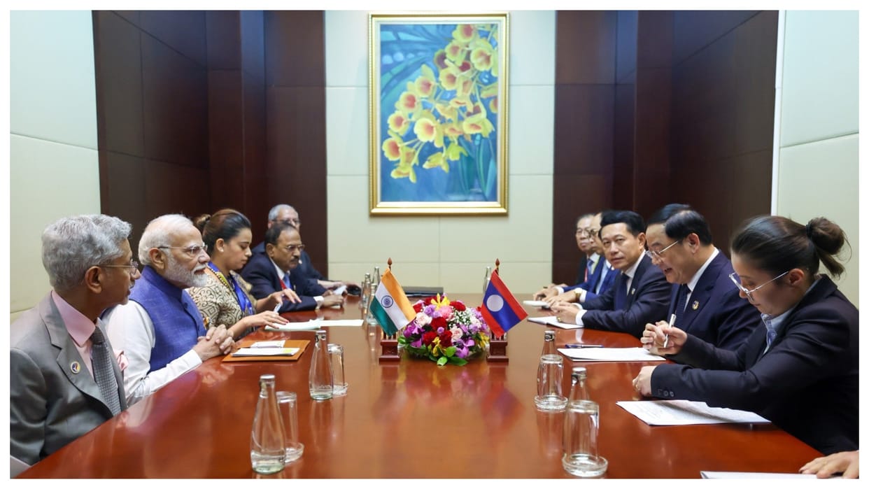 PM Narendra Modi discusses way to strengthen ties with Laos pm Sonexay Siphandone economic and defence
