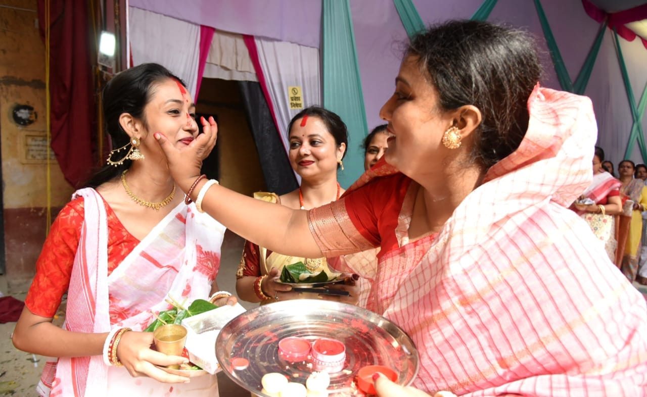 Women play sindoor on the day of Durga idols immersion in Lucknow.